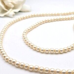 Vintage Crown Trifari 23-Inch Cream Strand Glass Faux Pearl Beaded Necklace